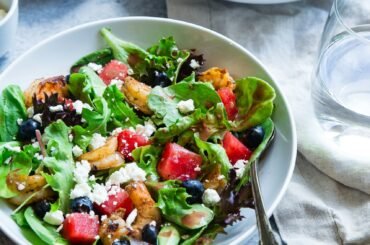 vegetable salad on white ceramic bowl